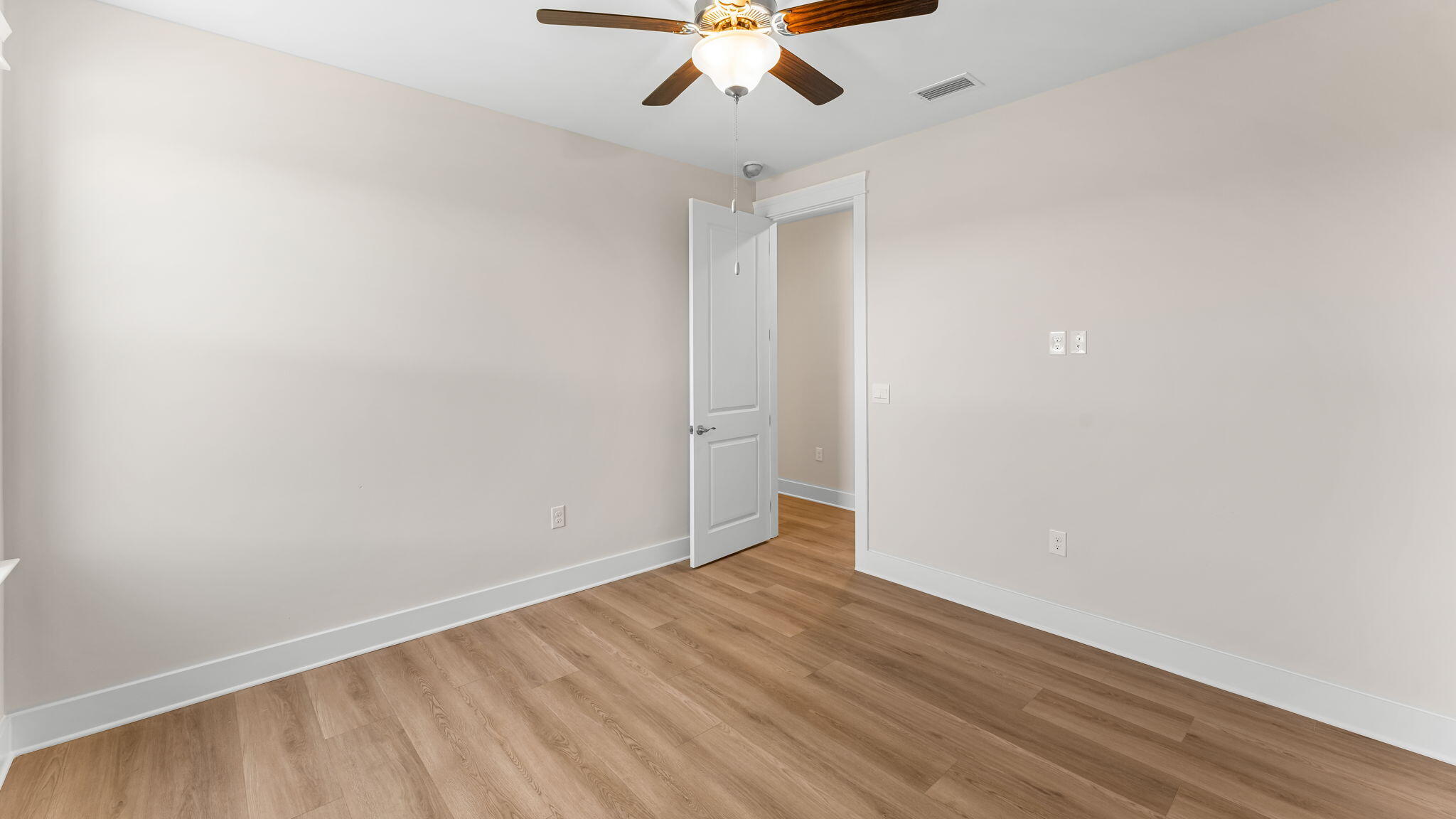 123 Marsh View Ridge Ln Cape Port St. Joe, FL 32456 - Photo 24 of 34 wooden floor in an empty room
