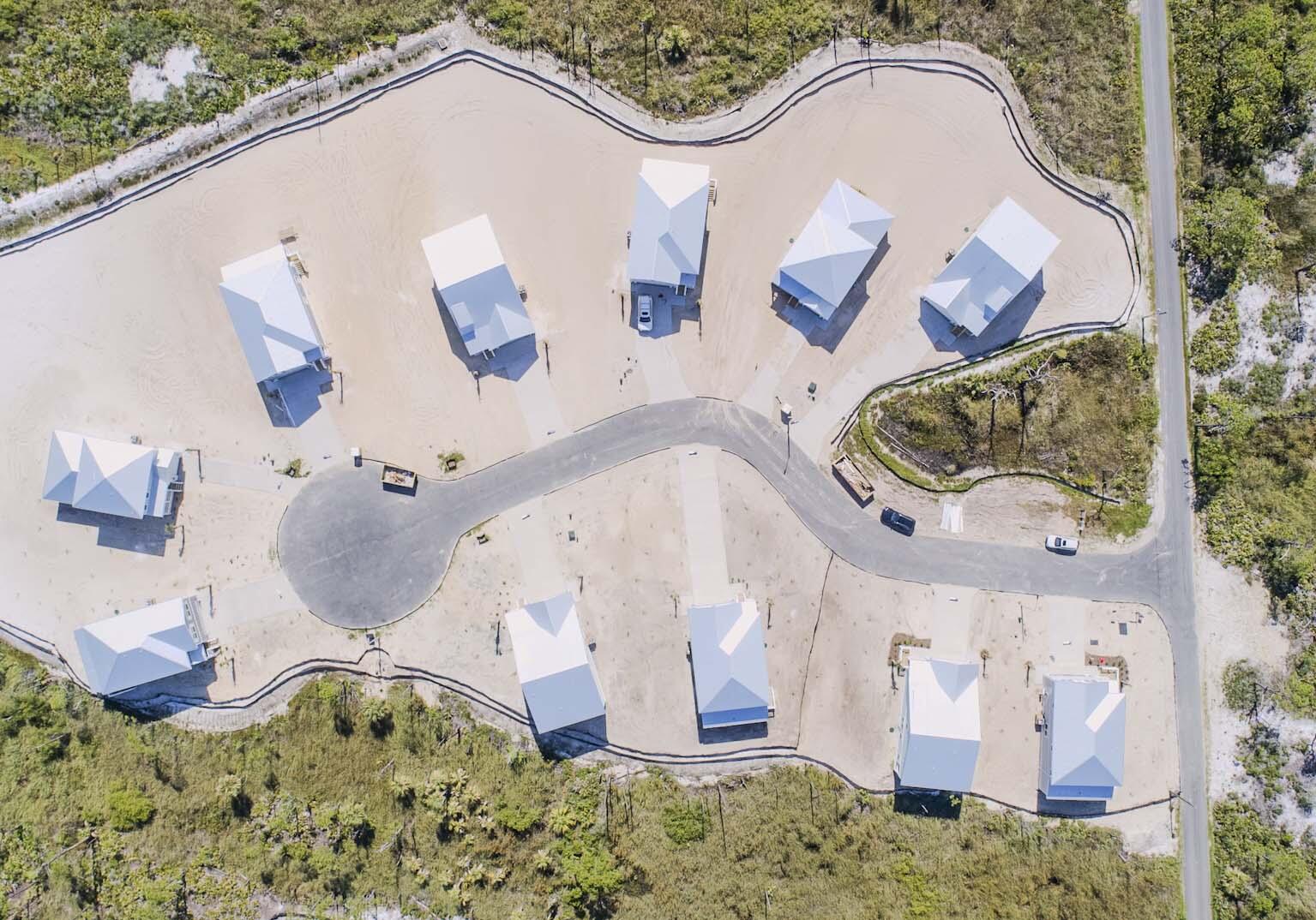 123 Marsh View Ridge Ln Cape Port St. Joe, FL 32456 - Photo 3 of 34 a bathroom with a sink and mirror