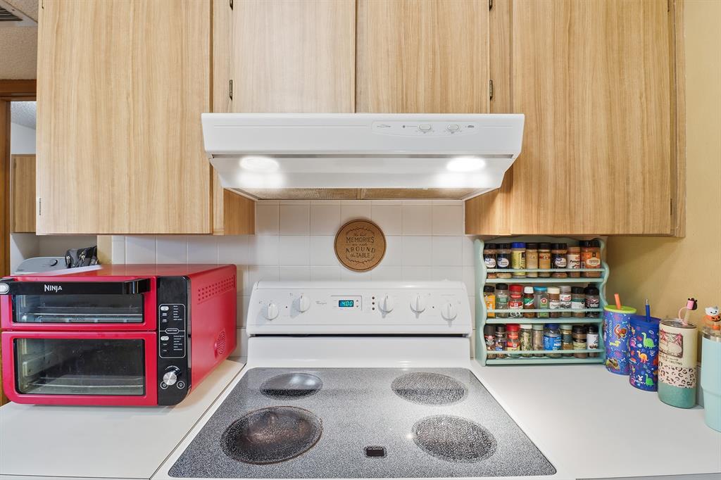 3050 East Possum Court Inverness, FL 34452 - Photo 16 of 65 a kitchen with a cabinets and appliances