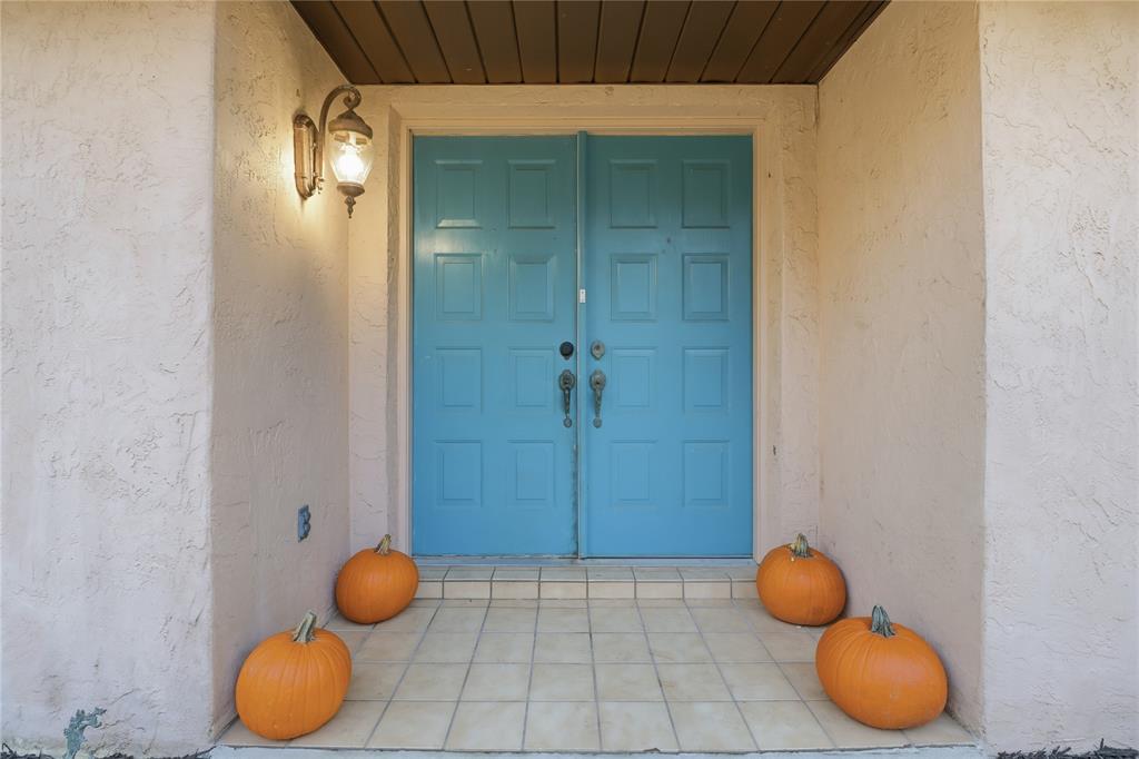3050 East Possum Court Inverness, FL 34452 - Photo 5 of 65 a bathroom with a granite countertop sink and a mirror