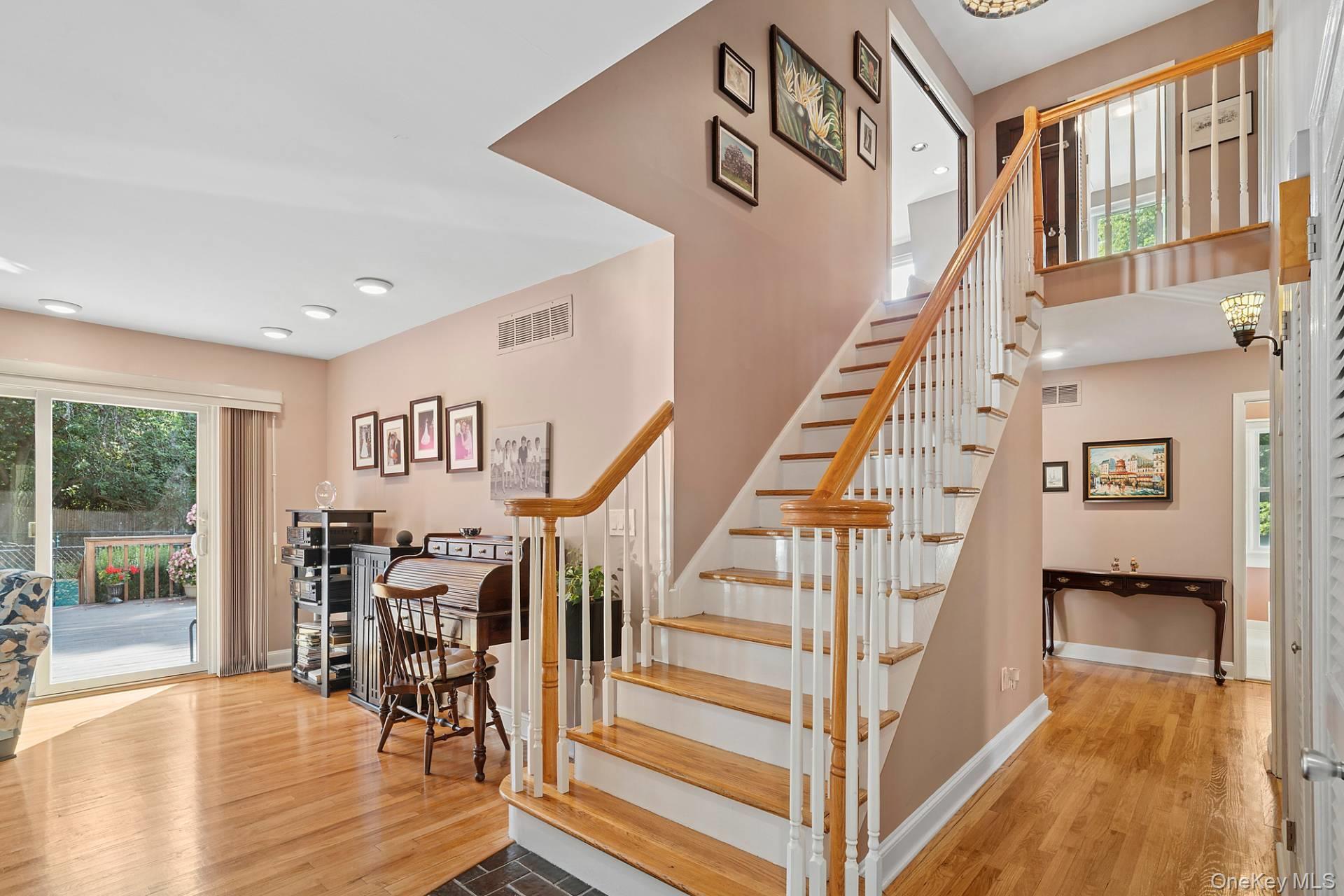 28 Plain View Drive Wading River, NY 11792 - Photo 11 of 20 a view of entryway and hall with wooden floor