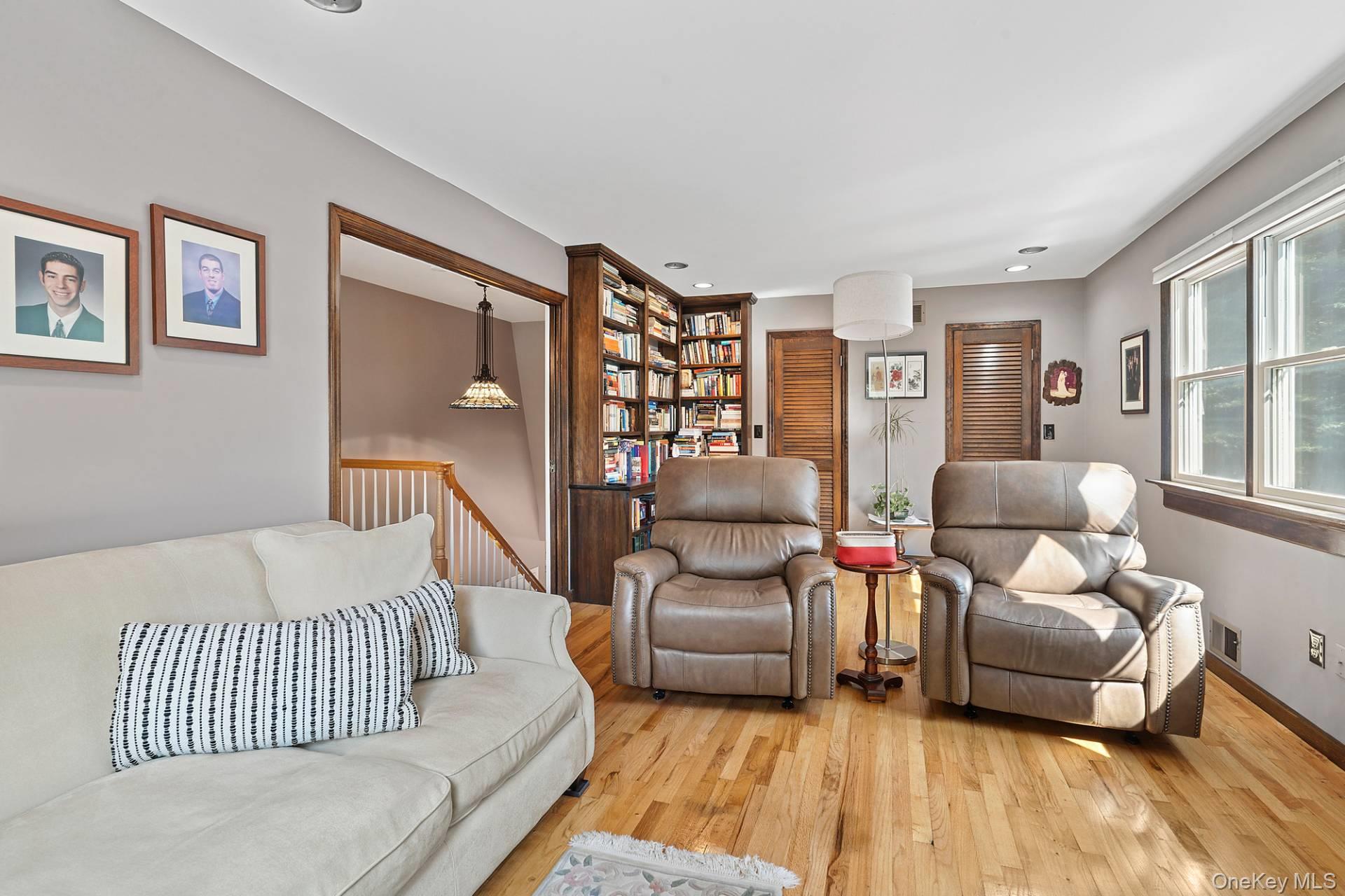 28 Plain View Drive Wading River, NY 11792 - Photo 13 of 20 a bedroom with furniture and a couch