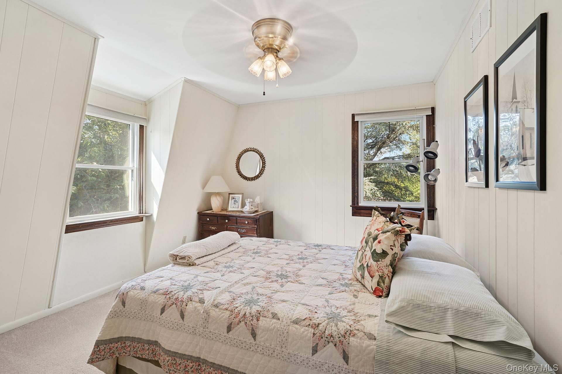 28 Plain View Drive Wading River, NY 11792 - Photo 14 of 20 a bedroom with a bed and a window