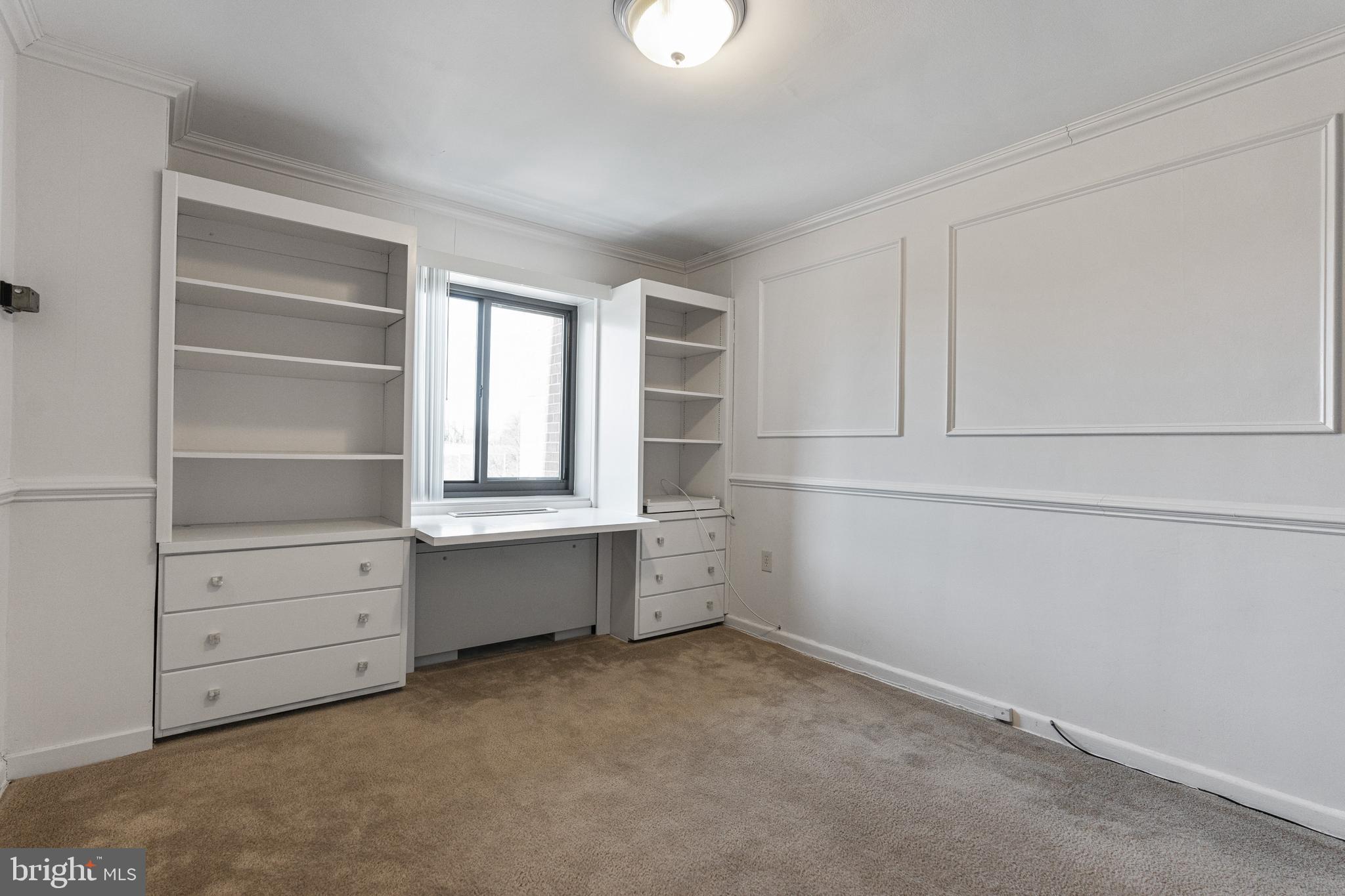 1300 South Arlington Ridge Road, Unit 402 Arlington, VA 22202 - Photo 11 of 23 a room with cabinets and window