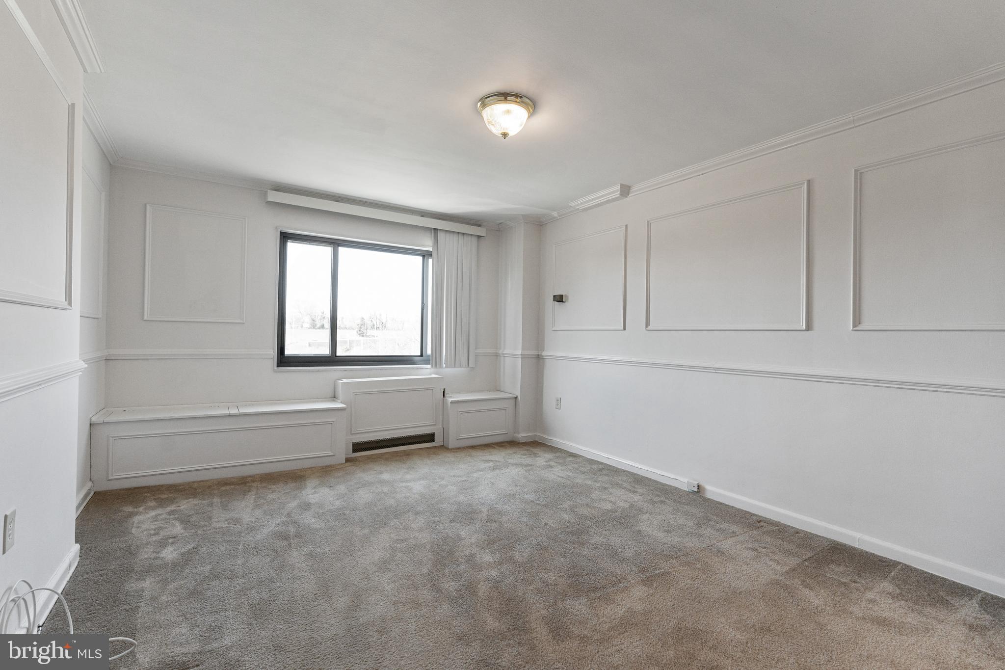 1300 South Arlington Ridge Road, Unit 402 Arlington, VA 22202 - Photo 15 of 23 a view of an empty room with a window