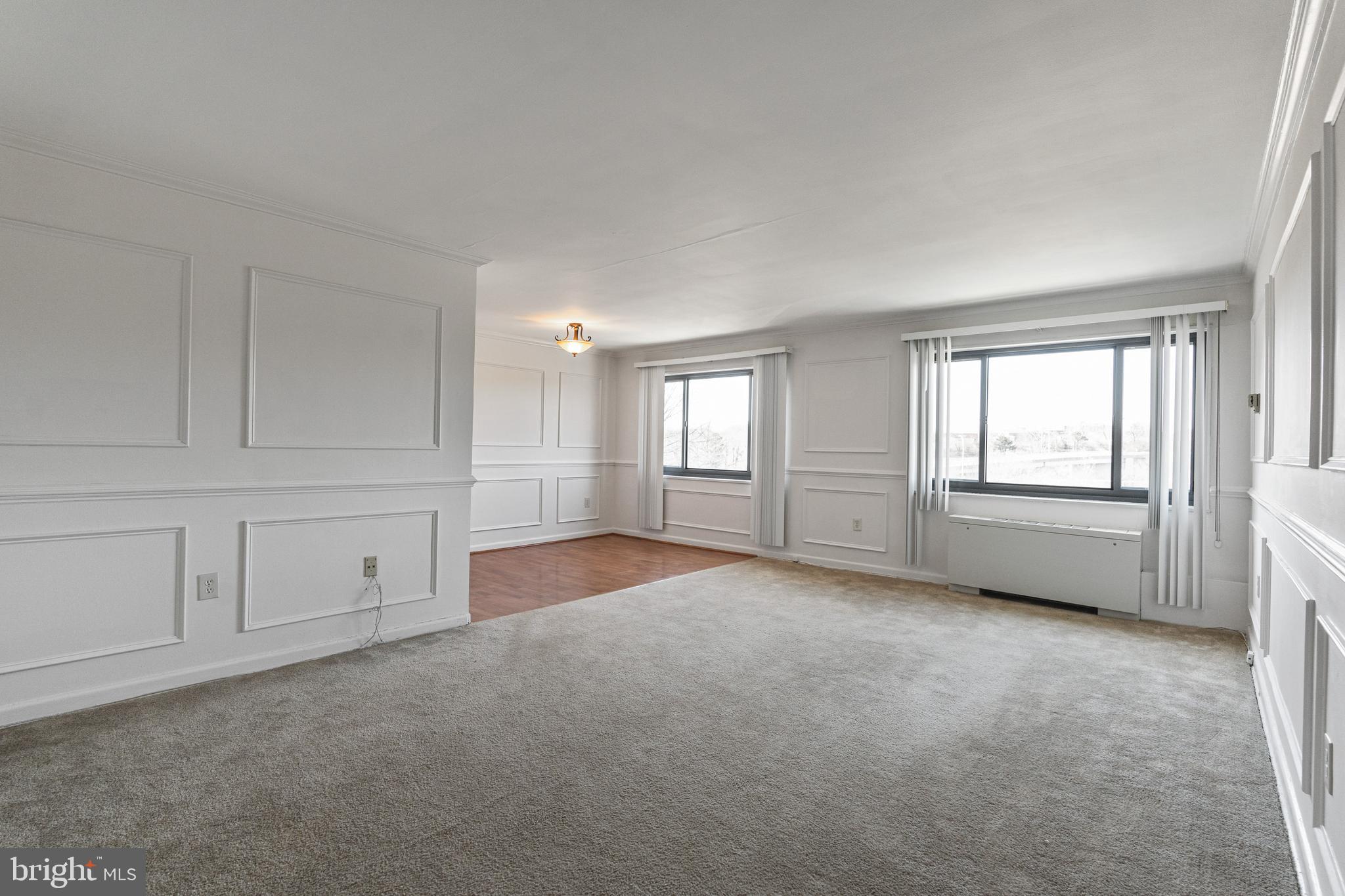 1300 South Arlington Ridge Road, Unit 402 Arlington, VA 22202 - Photo 9 of 23 a view of an empty room with a window