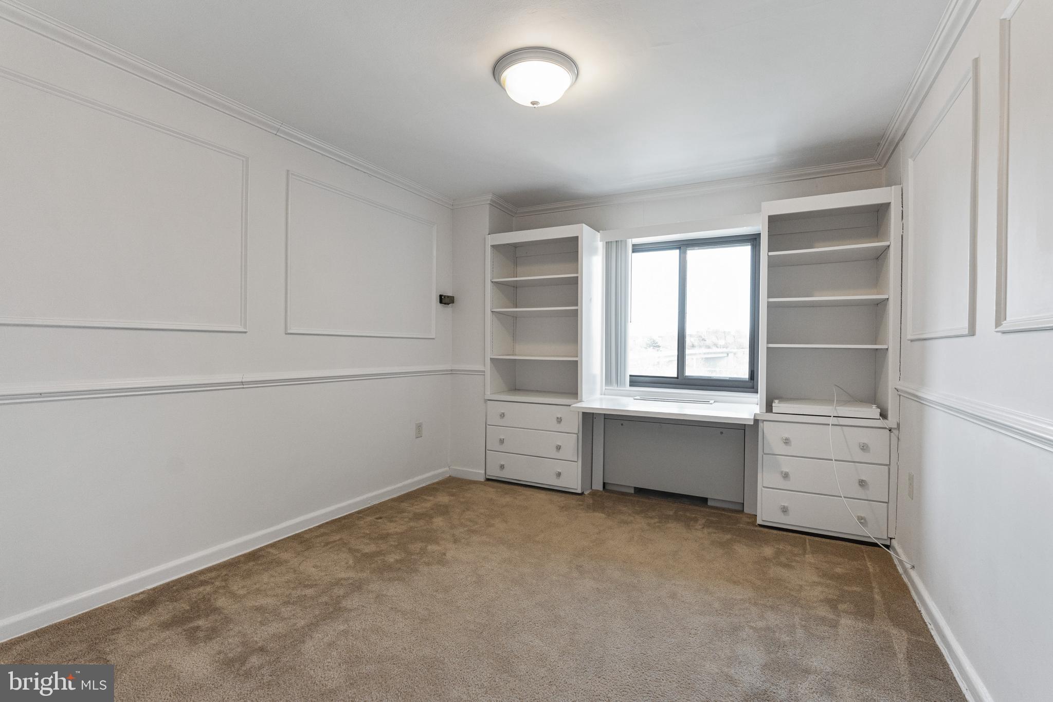 1300 South Arlington Ridge Road, Unit 402 Arlington, VA 22202 - Photo 10 of 23 a room with furniture and window