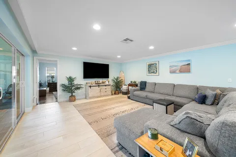 a bathroom with a granite countertop bathtub and a toilet