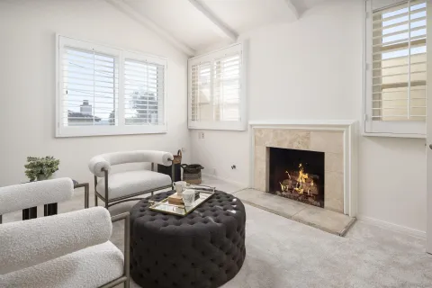 a bathroom with a sink a vanity a mirror and a bathtub