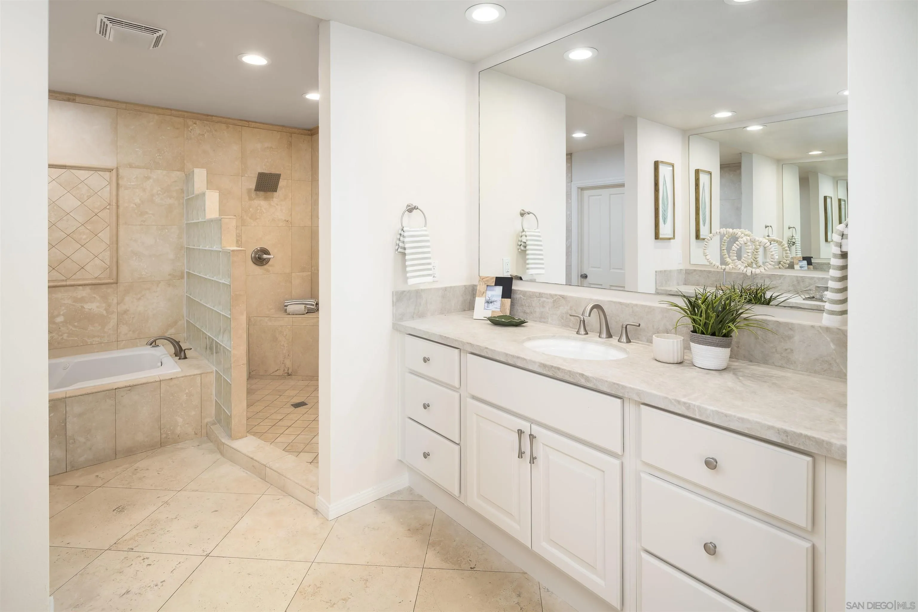 6129 La Flecha Rancho Santa Fe, CA 92067 - Photo 20 of 33 a bathroom with a double vanity sink mirror and shower