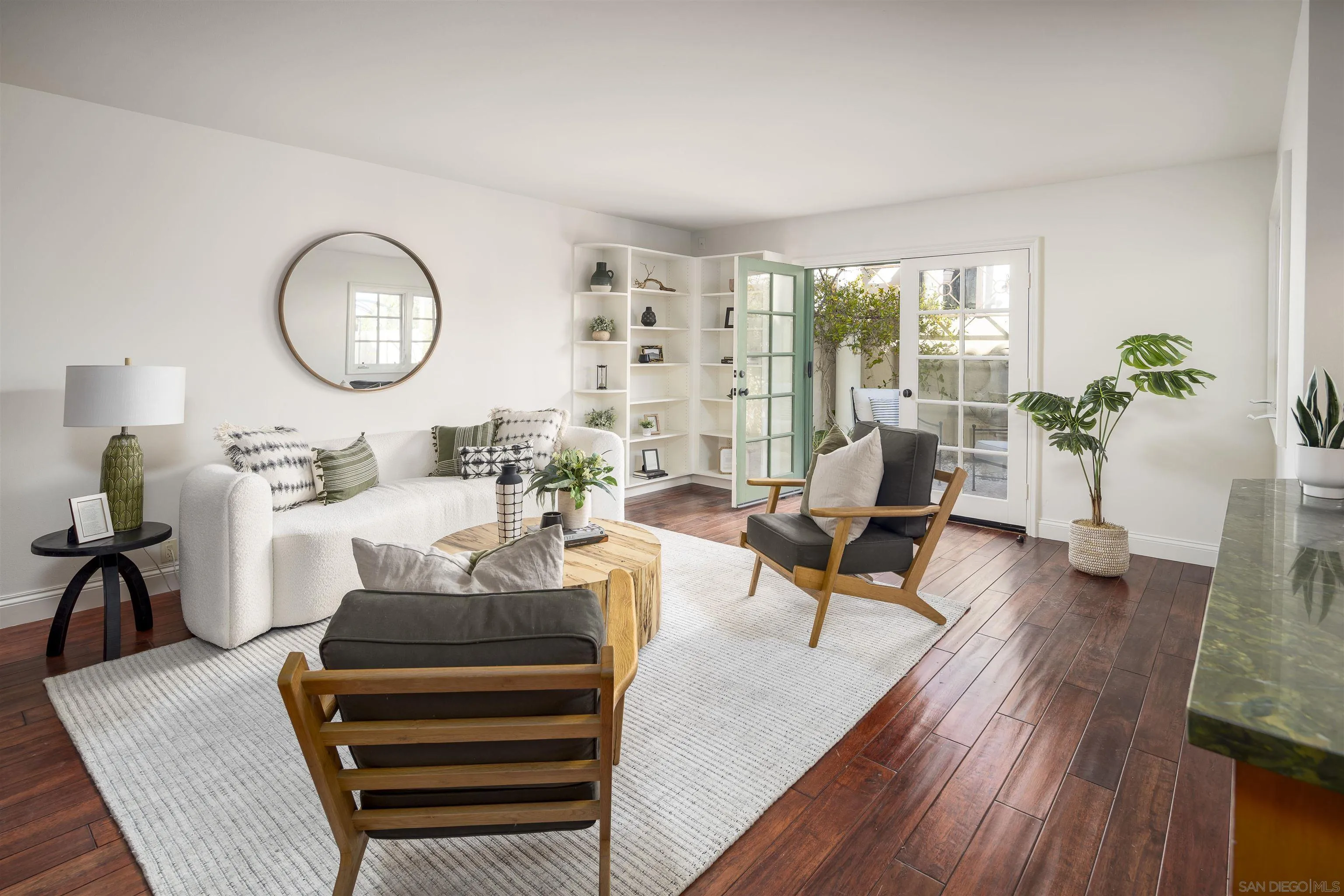 6129 La Flecha Rancho Santa Fe, CA 92067 - Photo 2 of 33 a living room with furniture a table and wooden floor