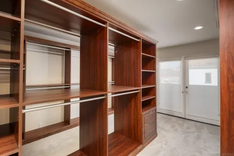 a view of a room with a large window