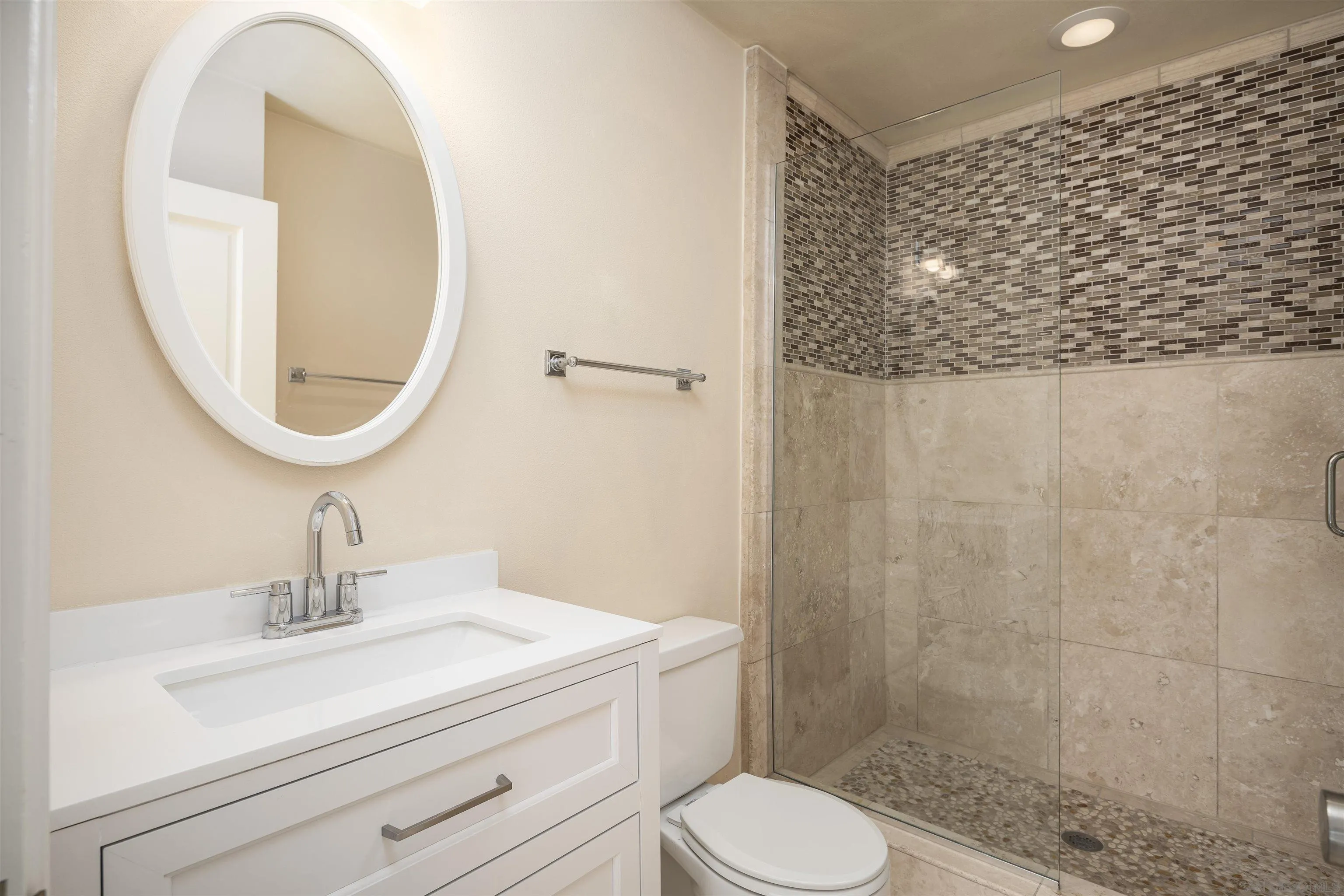 6129 La Flecha Rancho Santa Fe, CA 92067 - Photo 25 of 33 a bathroom with a sink a toilet and a mirror