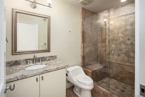 a view of hallway with wooden floor