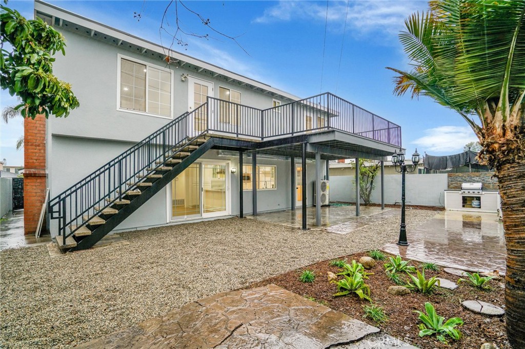 20233 Enslow Drive Carson, CA 90746 - Photo 21 of 22 a house with lots of trees in front of it