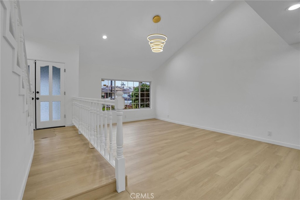 20233 Enslow Drive Carson, CA 90746 - Photo 4 of 22 a view of a hallway with a window