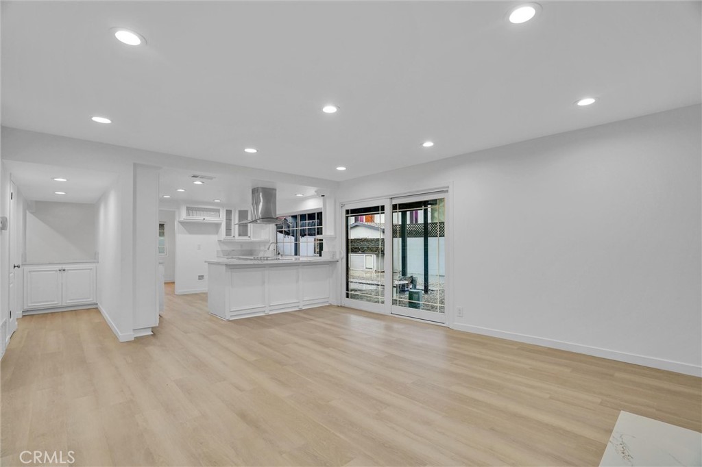 20233 Enslow Drive Carson, CA 90746 - Photo 6 of 22 a view of an empty room with kitchen and window
