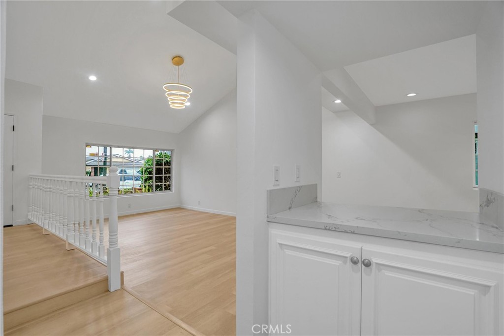 20233 Enslow Drive Carson, CA 90746 - Photo 8 of 22 a view of entryway with a hall and a window