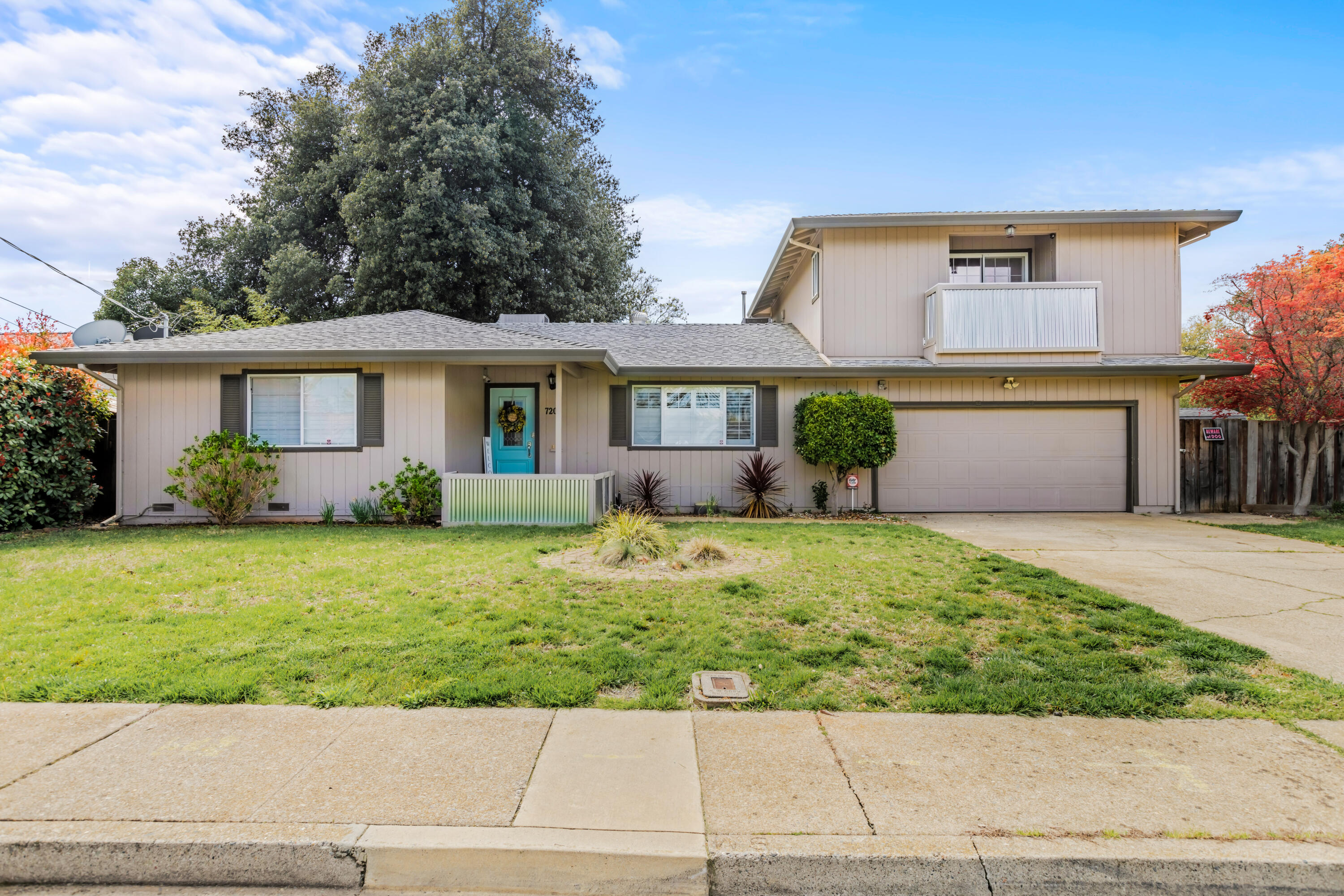 720 Lakeview Drive Redding, CA 96001 - Photo 1 of 38 a front view of a house with garden