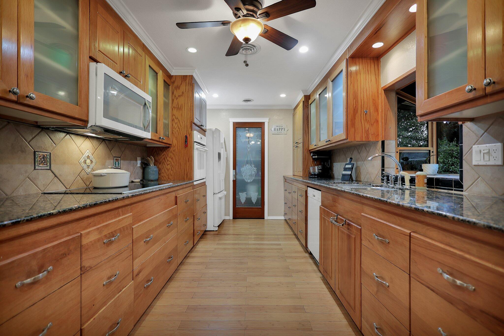 720 Lakeview Drive Redding, CA 96001 - Photo 11 of 38 a large kitchen with stainless steel appliances lots of counter space cabinets and a sink