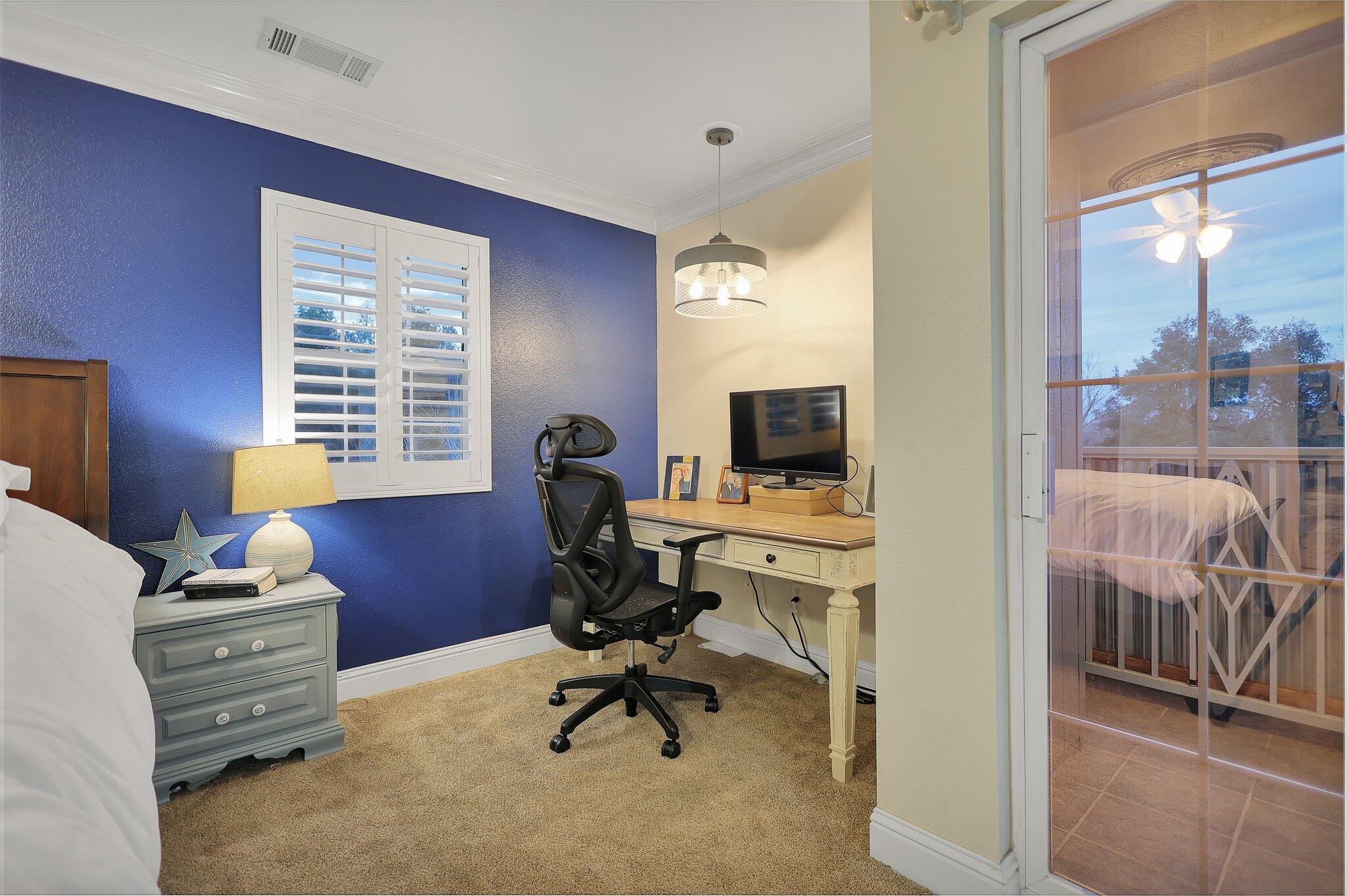 720 Lakeview Drive Redding, CA 96001 - Photo 18 of 38 a view of a workspace with furniture and a window