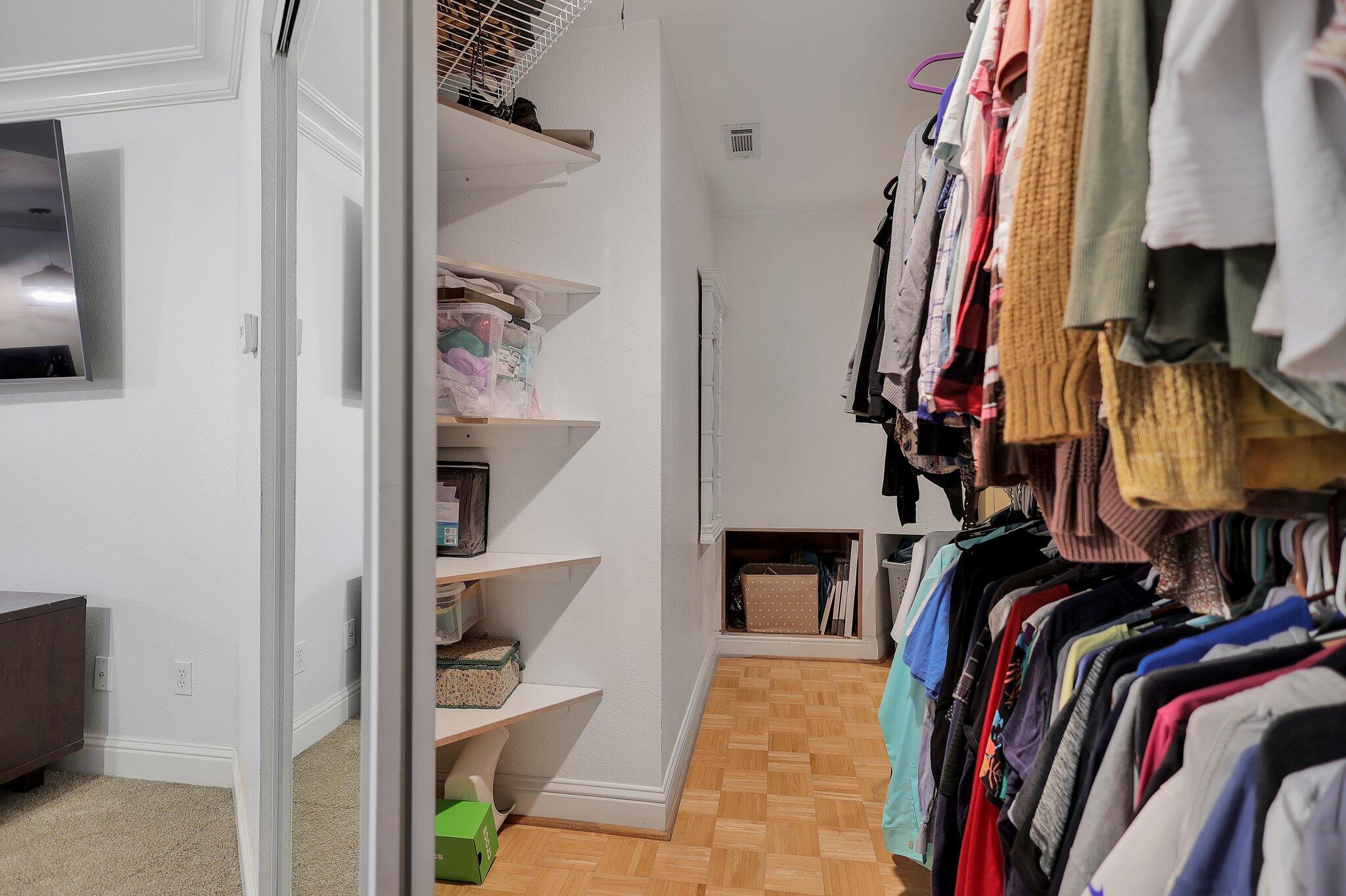 720 Lakeview Drive Redding, CA 96001 - Photo 23 of 38 a view of walk in closet with clothes and shoes