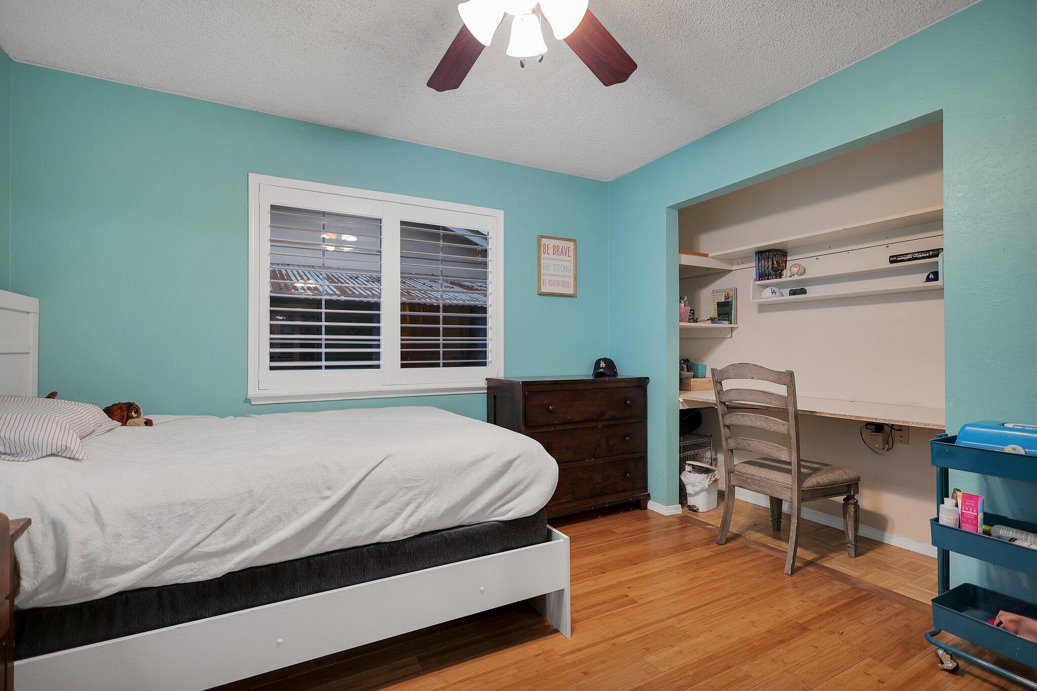 720 Lakeview Drive Redding, CA 96001 - Photo 28 of 38 a bedroom with a bed and a window