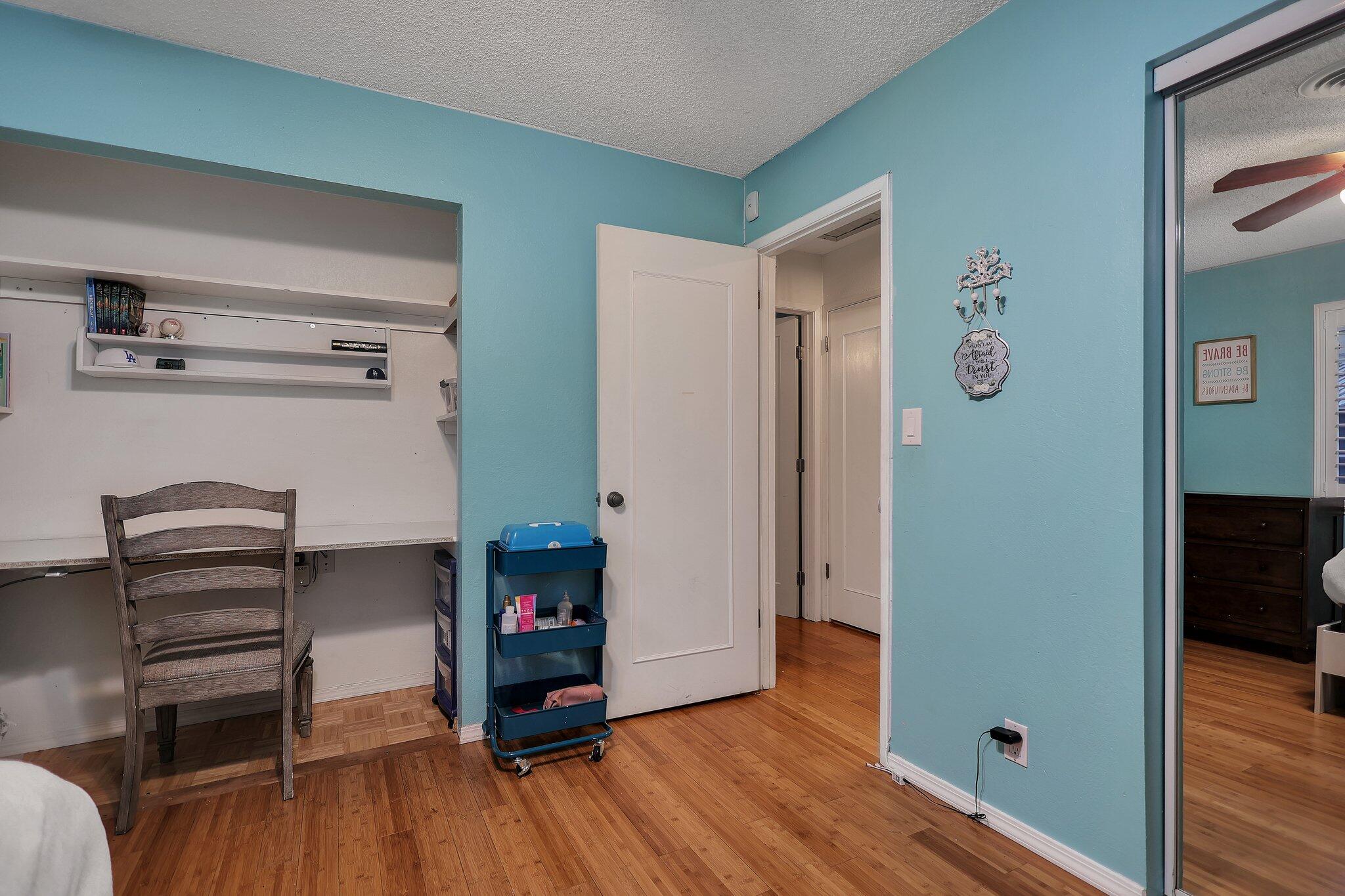 720 Lakeview Drive Redding, CA 96001 - Photo 29 of 38 a room with a closet and wooden floor