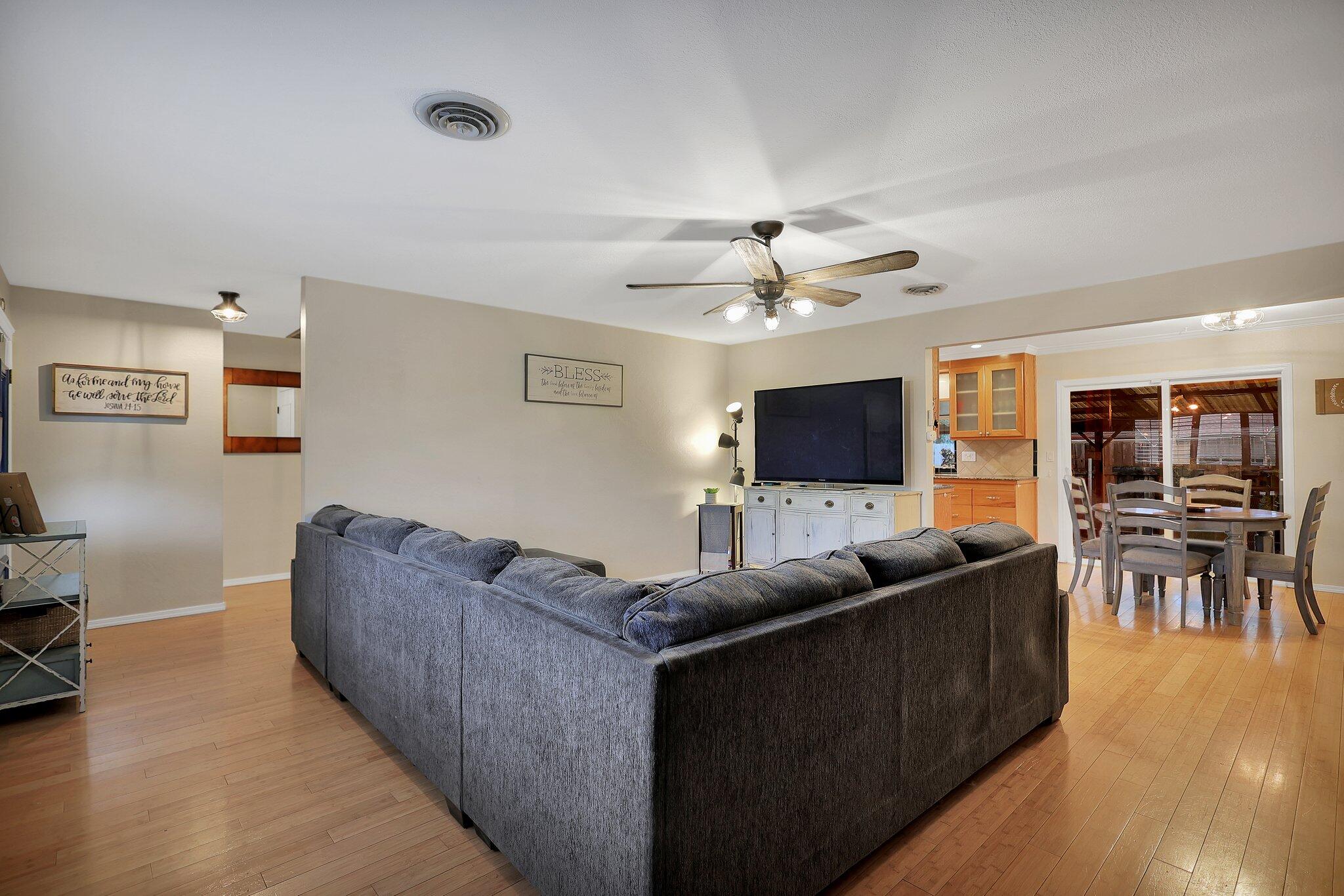 720 Lakeview Drive Redding, CA 96001 - Photo 4 of 38 a living room with furniture and a flat screen tv