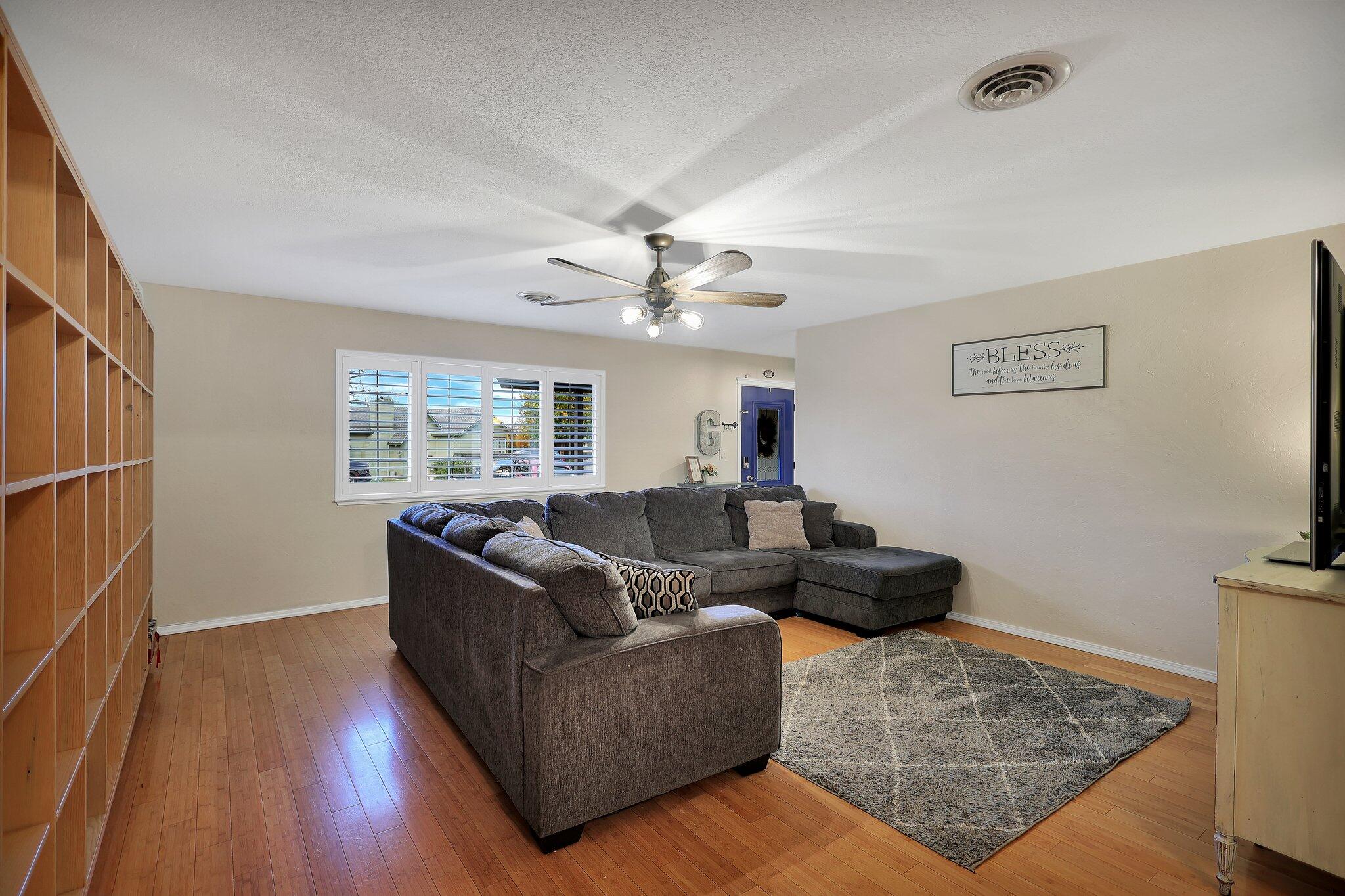 720 Lakeview Drive Redding, CA 96001 - Photo 6 of 38 a living room with furniture and a wooden floor