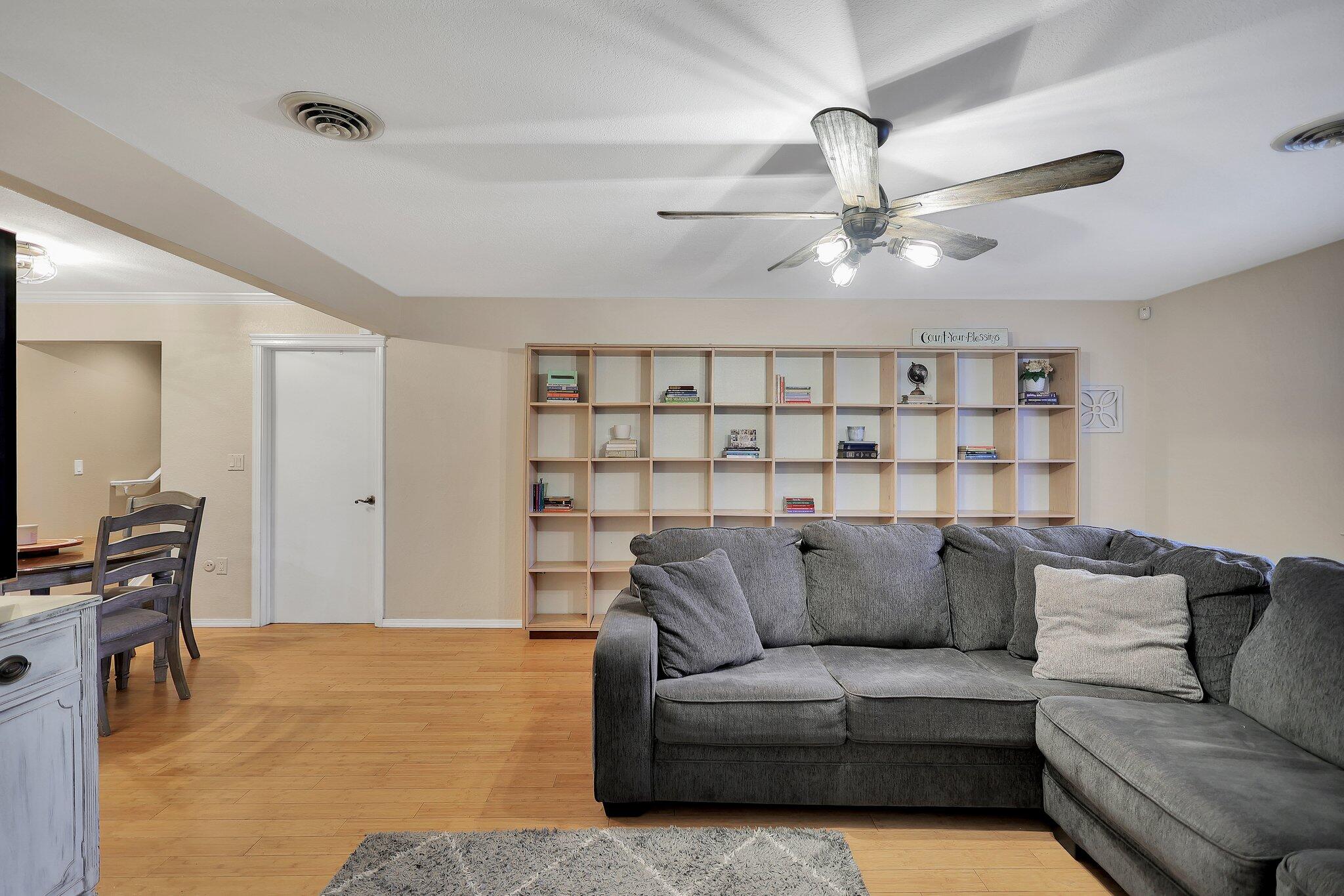 720 Lakeview Drive Redding, CA 96001 - Photo 7 of 38 a living room with furniture a ceiling fan and a rug