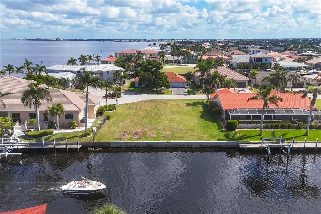 7 Hibiscus Drive Punta Gorda, FL 33950 - Photo 11 of 23 an aerial view of a house with a lake view