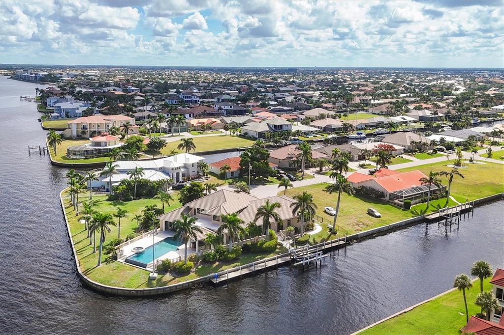 7 Hibiscus Drive Punta Gorda, FL 33950 - Photo 14 of 23 a view of a swimming pool with outdoor seating and city view