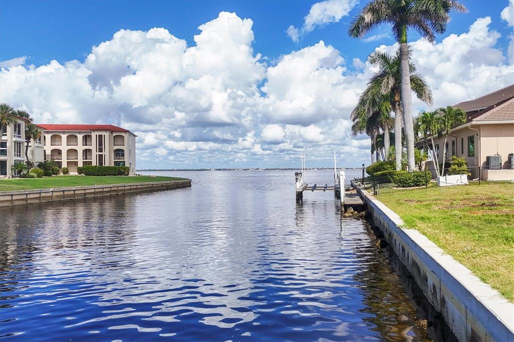 7 Hibiscus Drive Punta Gorda, FL 33950 - Photo 2 of 23 a view of swimming pool with a lake