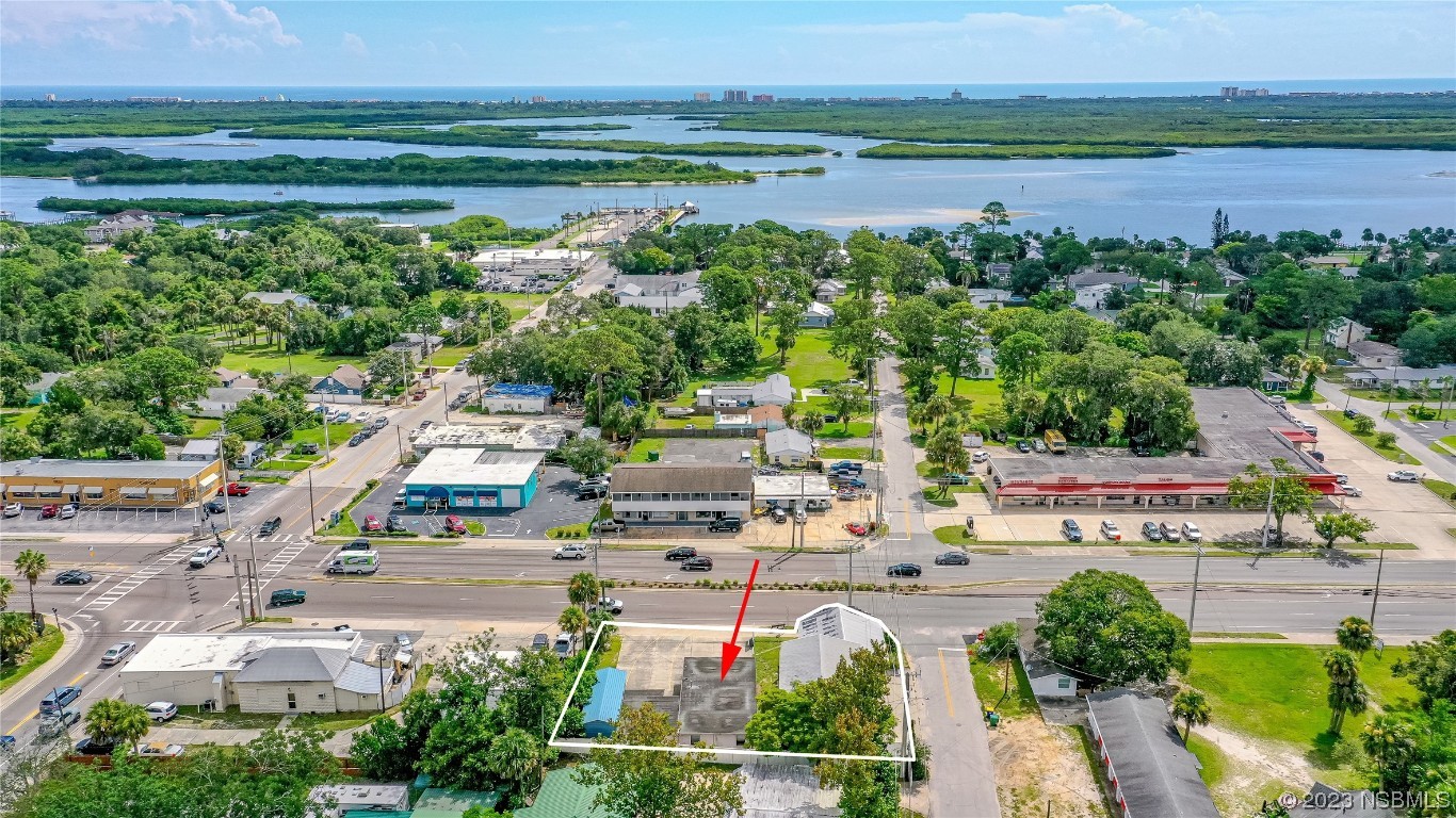 108 South Ridgewood Avenue Edgewater, FL 32132 - Photo 20 of 23 a view of lake with outdoor space