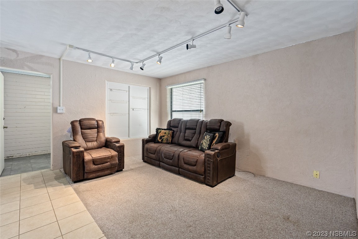 108 South Ridgewood Avenue Edgewater, FL 32132 - Photo 4 of 23 a living room with furniture