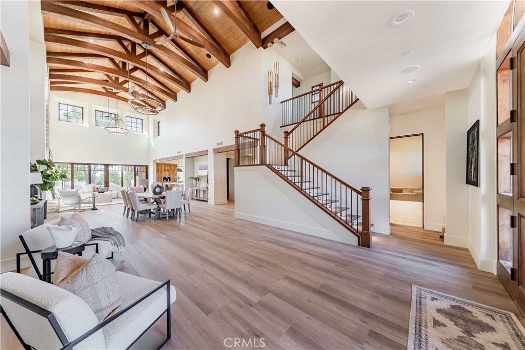 35995 Summit Circle Temecula, CA 92592 - Photo 14 of 75 a view of entryway livingroom and hall with wooden floor