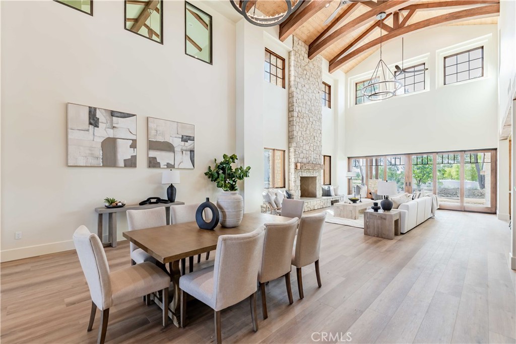35995 Summit Circle Temecula, CA 92592 - Photo 20 of 75 a view of a dining room with furniture window and wooden floor