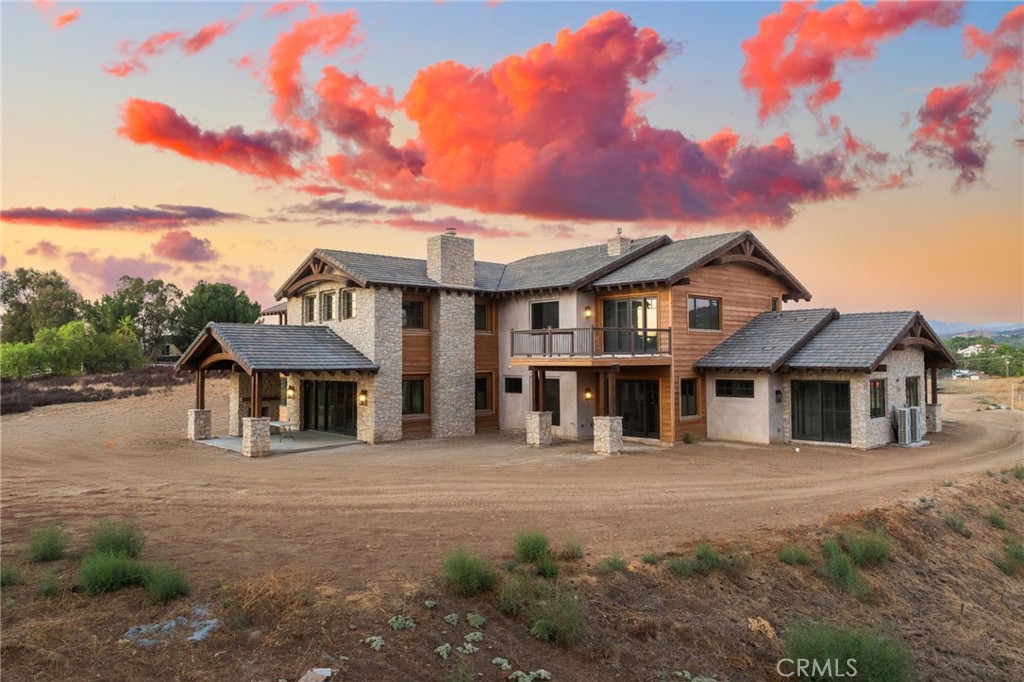 35995 Summit Circle Temecula, CA 92592 - Photo 2 of 75 a front view of a house with a yard