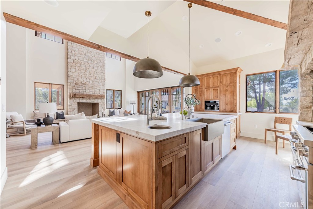 35995 Summit Circle Temecula, CA 92592 - Photo 28 of 75 a kitchen with stainless steel appliances granite countertop a stove and cabinets