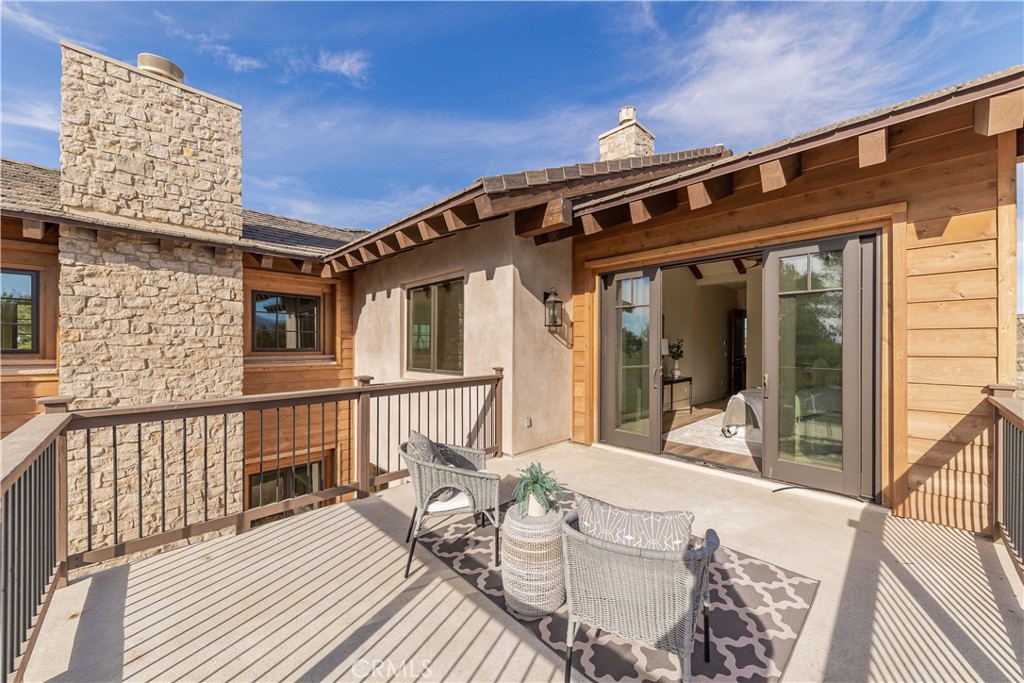 35995 Summit Circle Temecula, CA 92592 - Photo 58 of 75 a view of a house with wooden deck