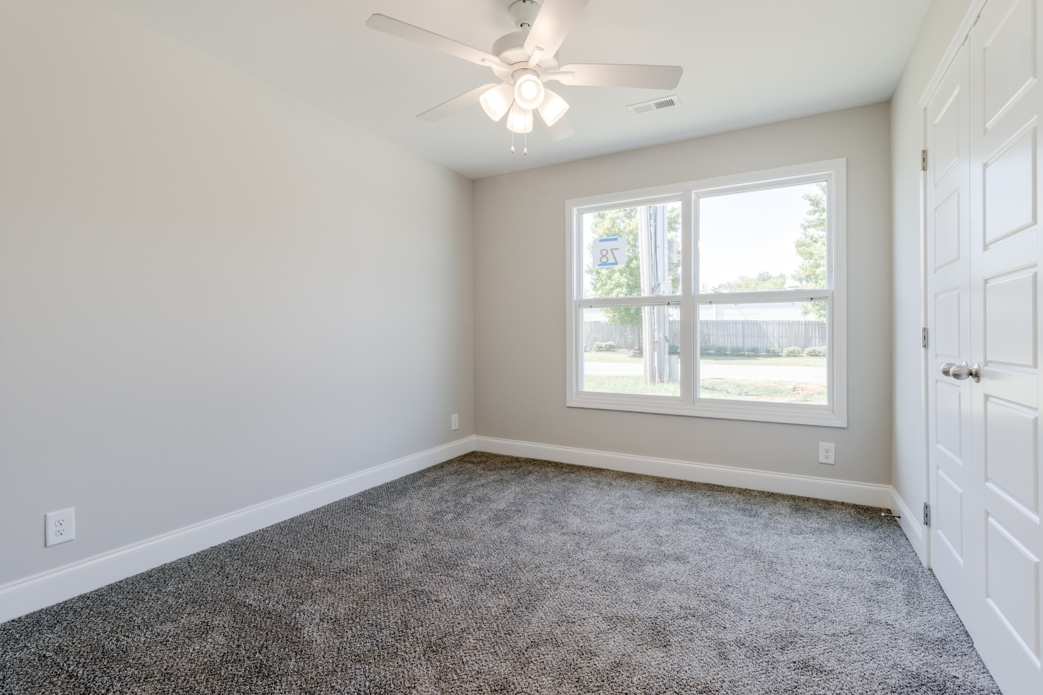 2909 Darrow Road Clarksville, TN 37042 - Photo 20 of 31 a view of room with window and ceiling fan