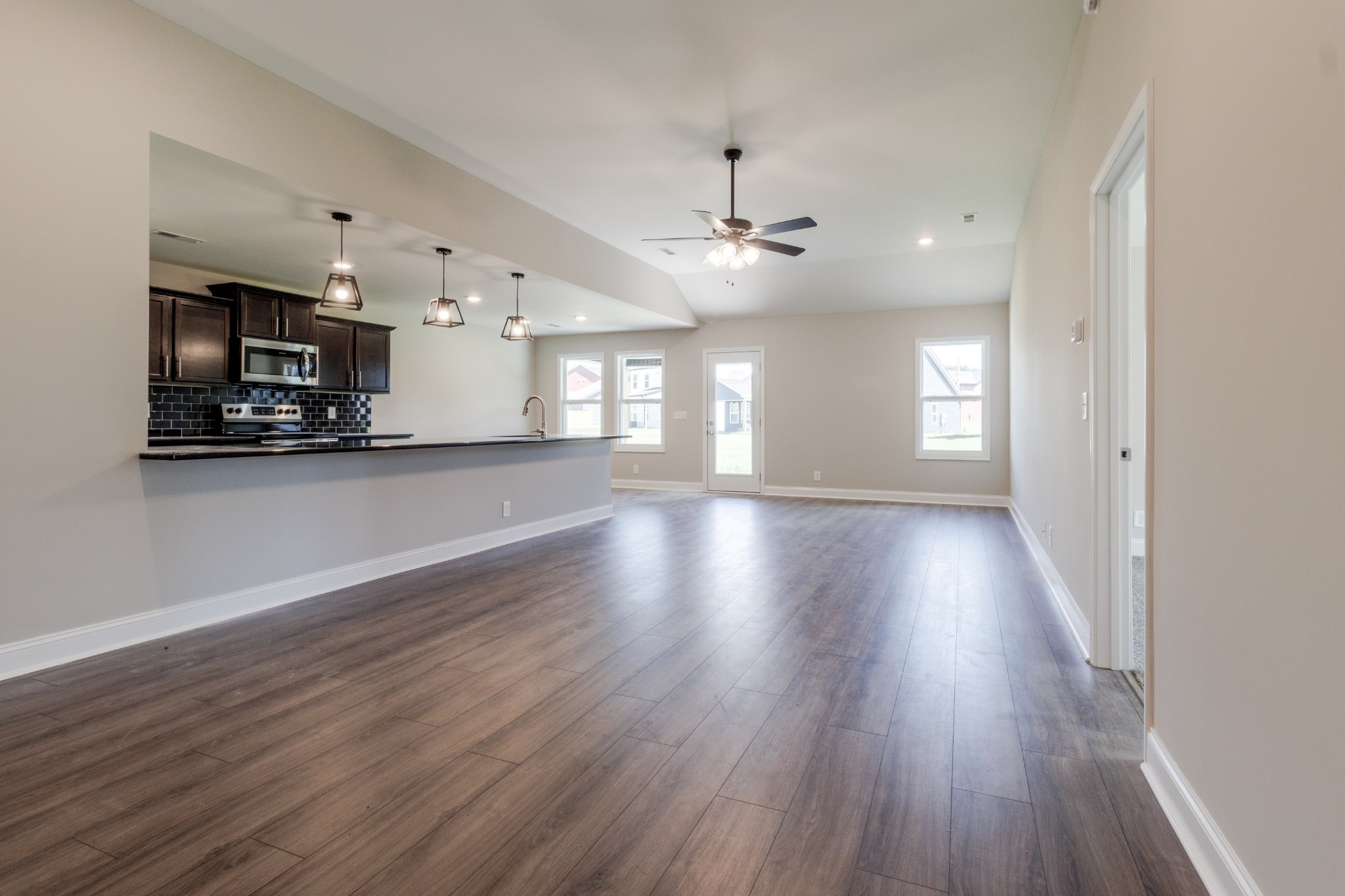 2909 Darrow Road Clarksville, TN 37042 - Photo 5 of 31 a view of a kitchen with a sink and wooden floor