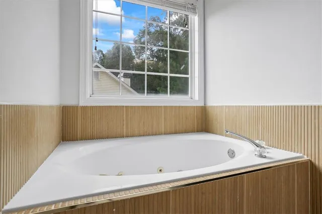 a bathroom with a bathtub