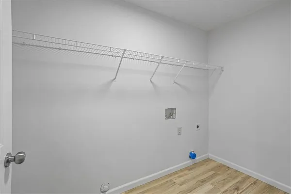 a view of a room with racks on the wall