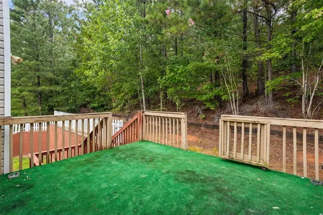 a view of backyard with green space