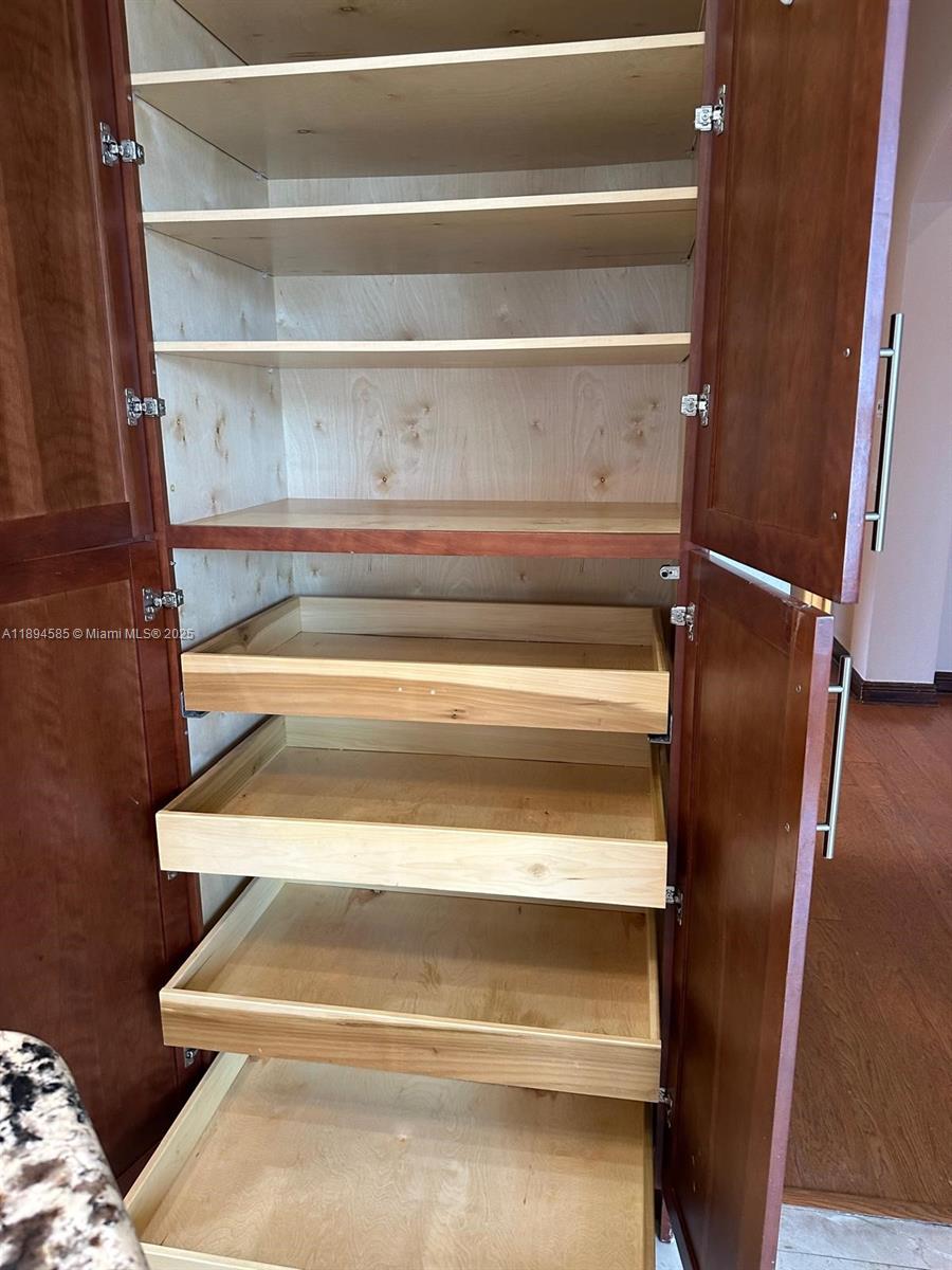 18580 Southwest 44th Street Miramar, FL 33029 - Photo 11 of 71 a view of closet with wooden floor