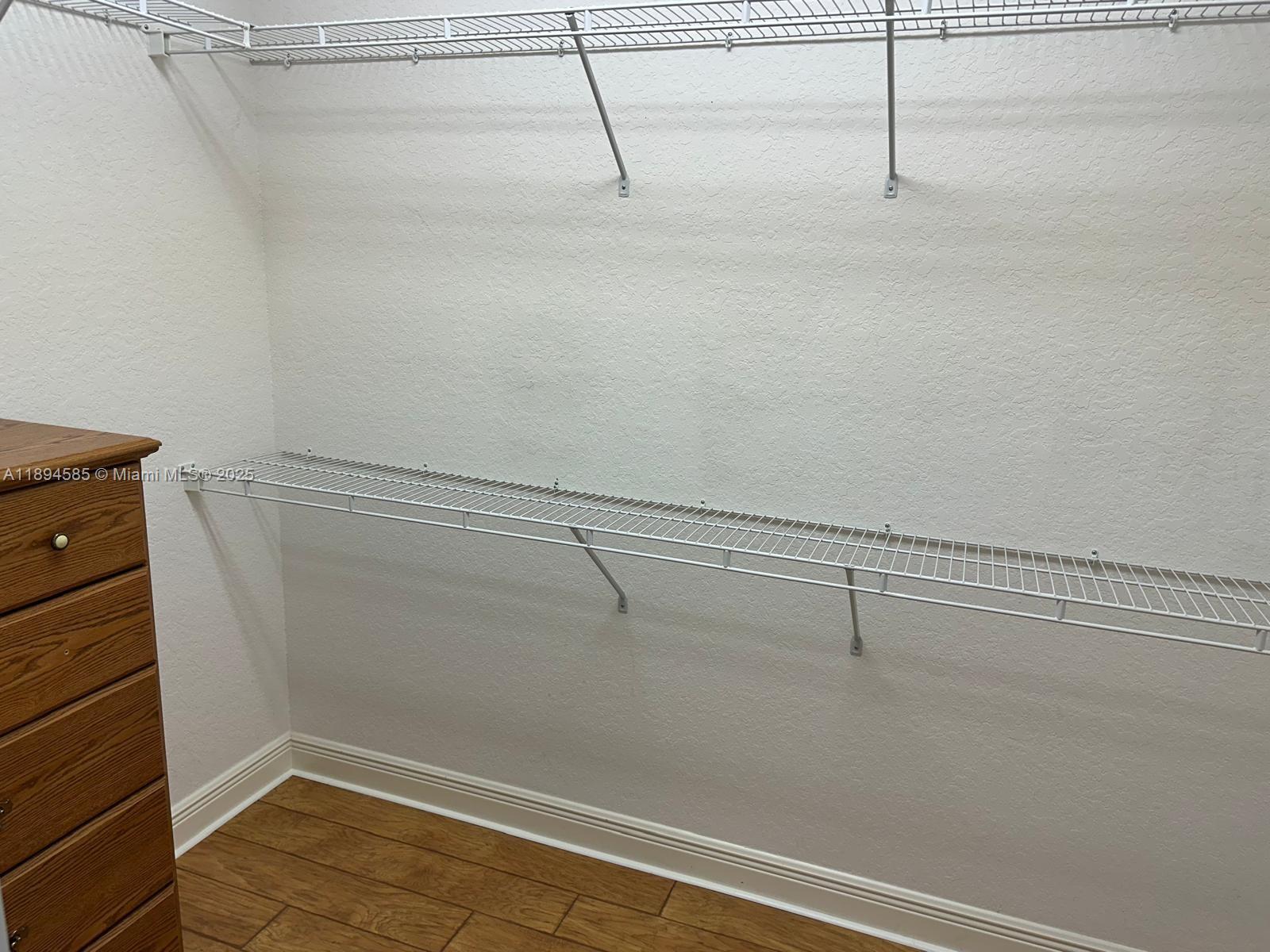 18580 Southwest 44th Street Miramar, FL 33029 - Photo 40 of 71 a view of a room with racks on the wall