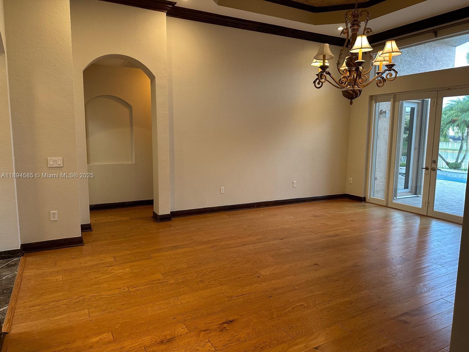 18580 Southwest 44th Street Miramar, FL 33029 - Photo 45 of 71 a view of a room with wooden floor