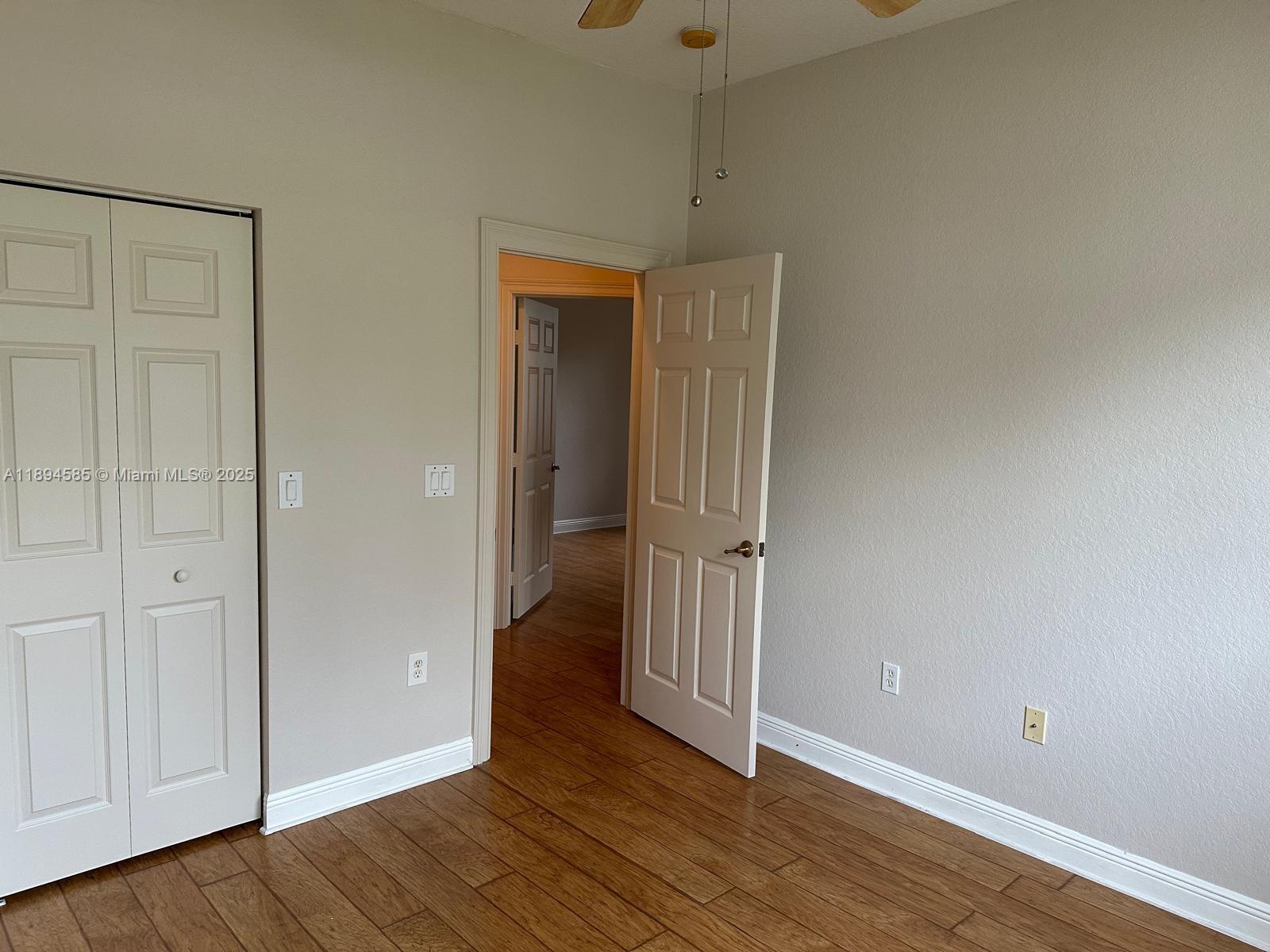 18580 Southwest 44th Street Miramar, FL 33029 - Photo 59 of 71 wooden floor in an empty room
